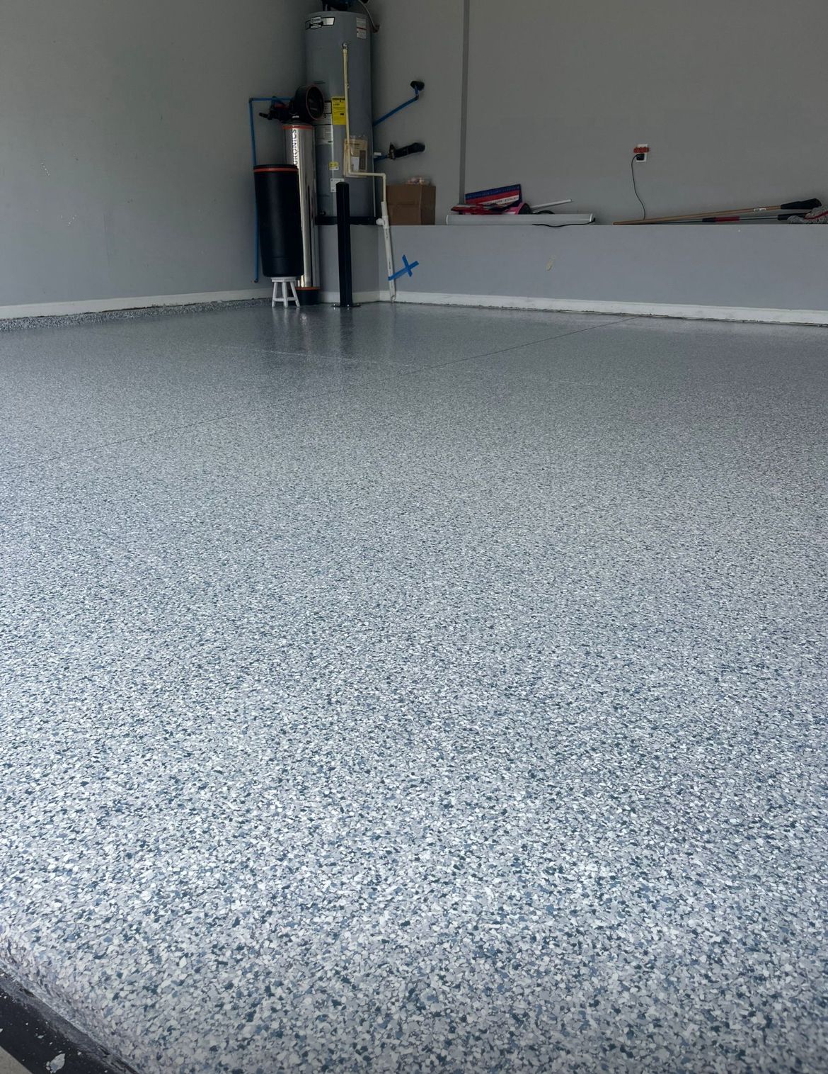 Residential garage coated with professional epoxy solution